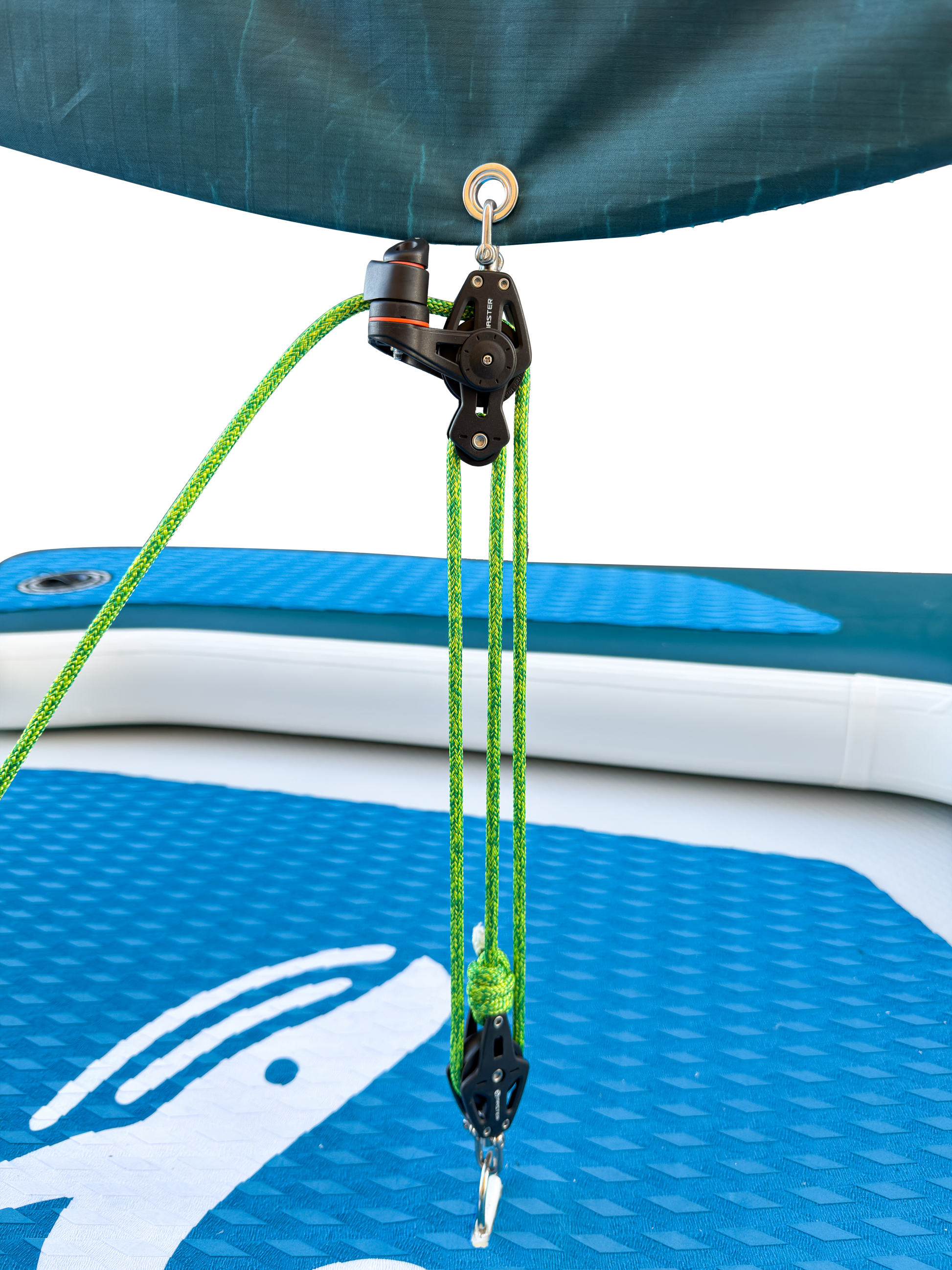 Close-up of a pulley system on an inflatable watercraft with green ropes.