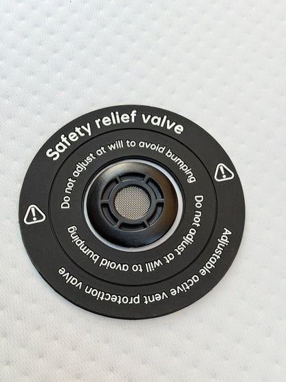 Safety relief valve on a textured white background