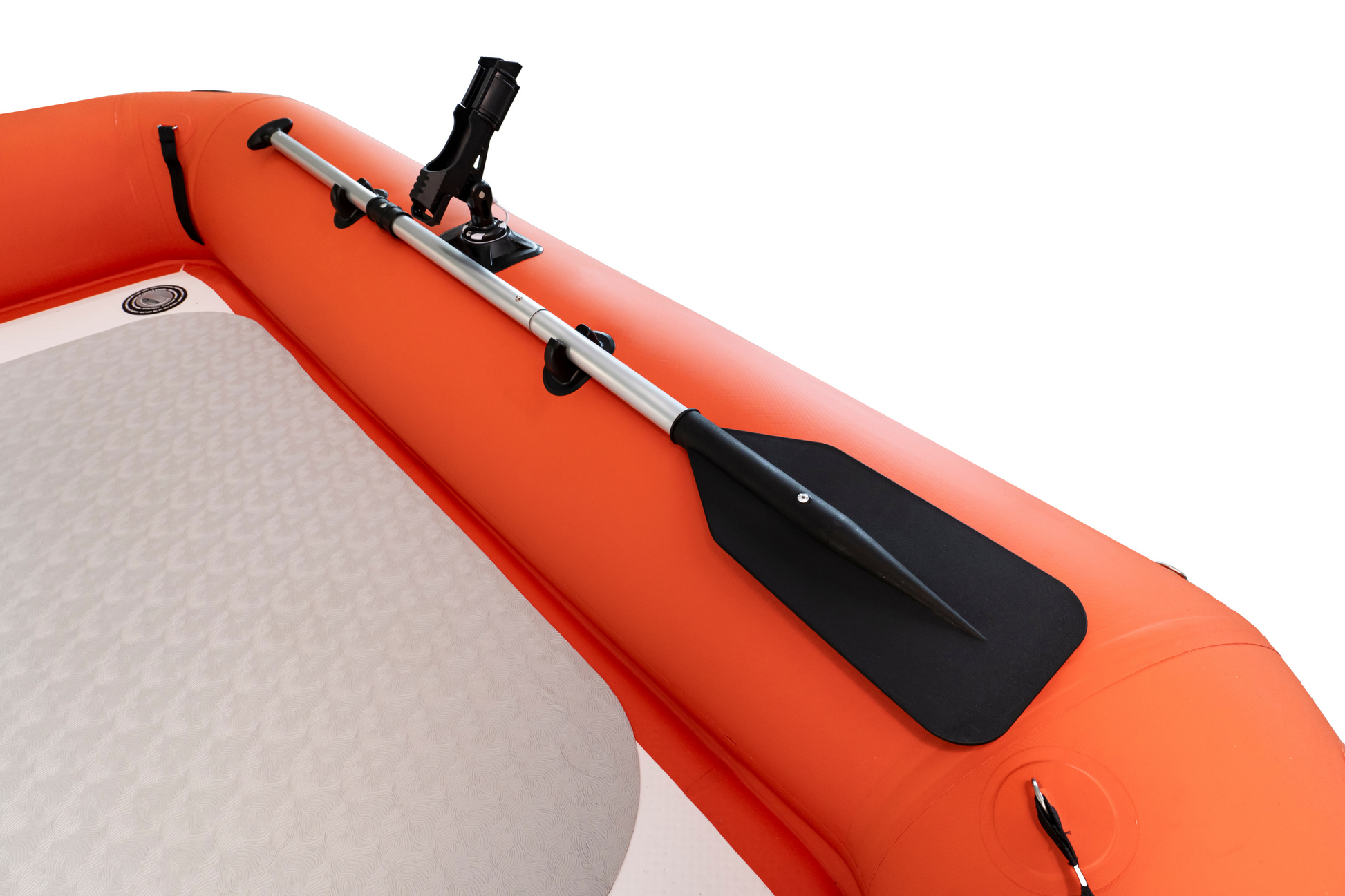 Inflatable boat with a paddle attached on a white background