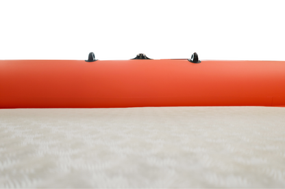 Close-up of an orange inflatable boat with black floor straps on a white background
