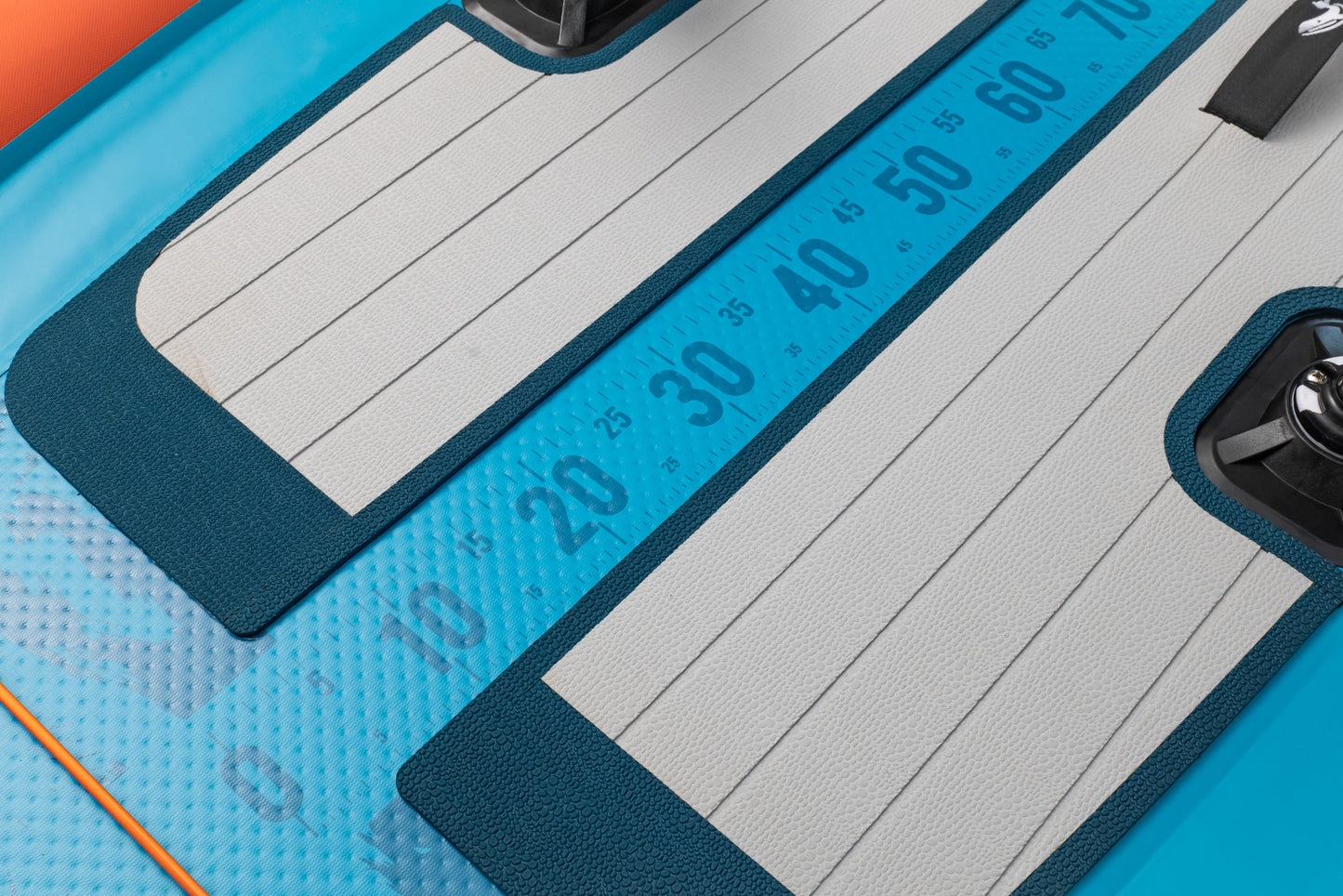 Close-up of a digital thermometer with temperature markings on a blue background