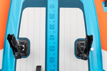 Close-up of a inflatable board with measurement scale and foot straps.