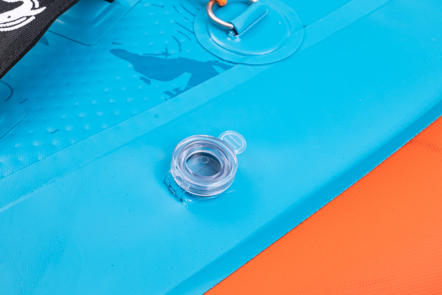 Close-up of a blue and orange inflatable pool with a clear valve.