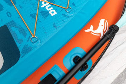 Close-up of a blue and orange inflatable paddle board with a brand logo.